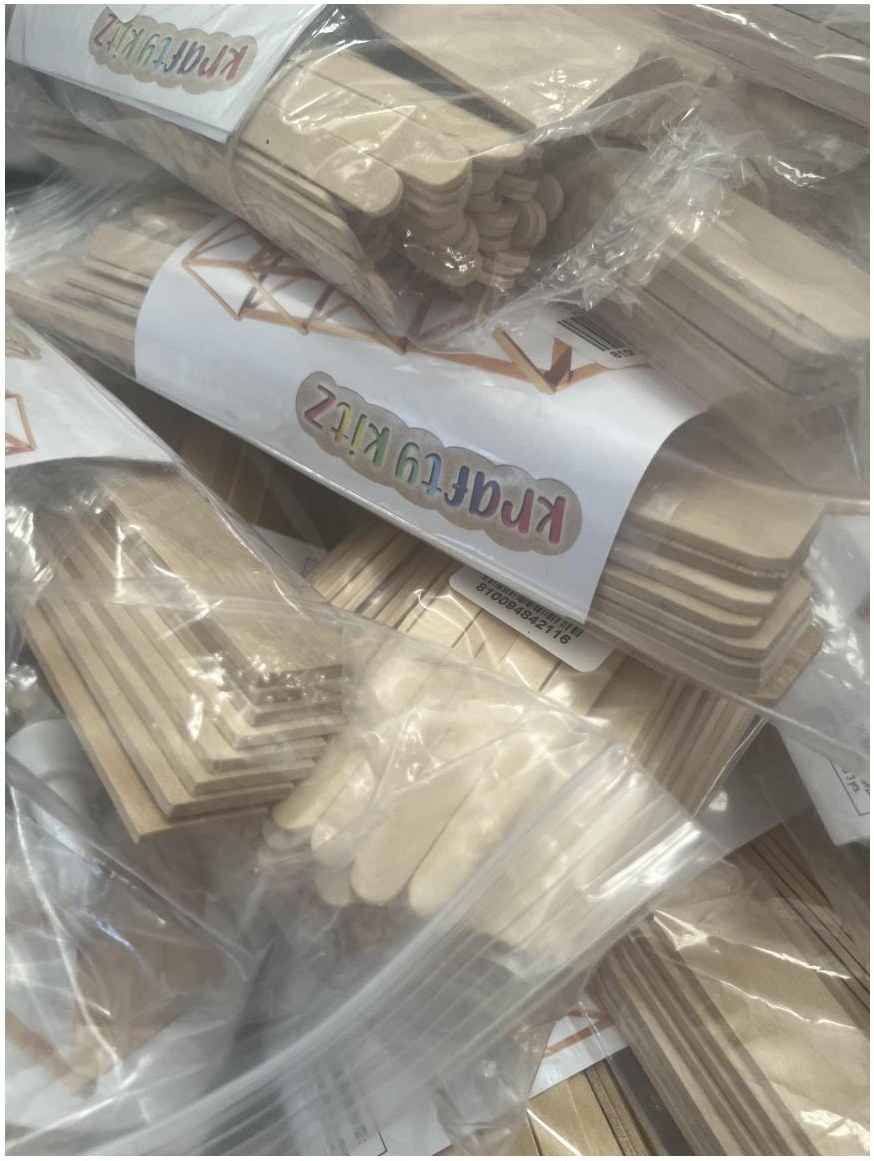 Hands-on wooden building activity in a kit